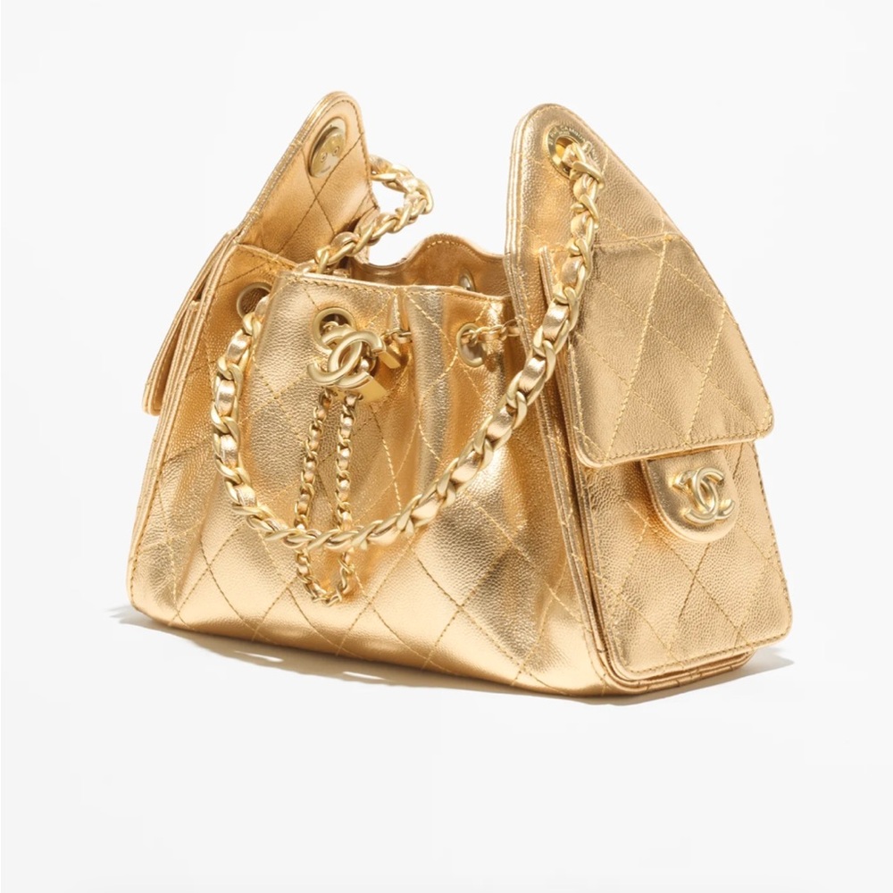 CHANEL 25 MINI HANDBAG in gold